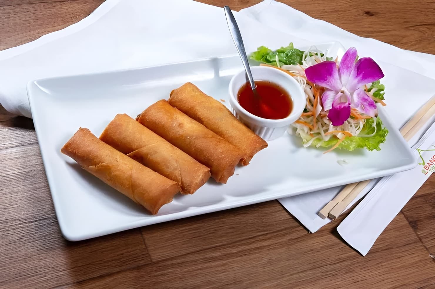 Egg Rolls (Veggie or Chicken) (4 crispy rolls) plated at Maly Thai restaurant in St. Charles